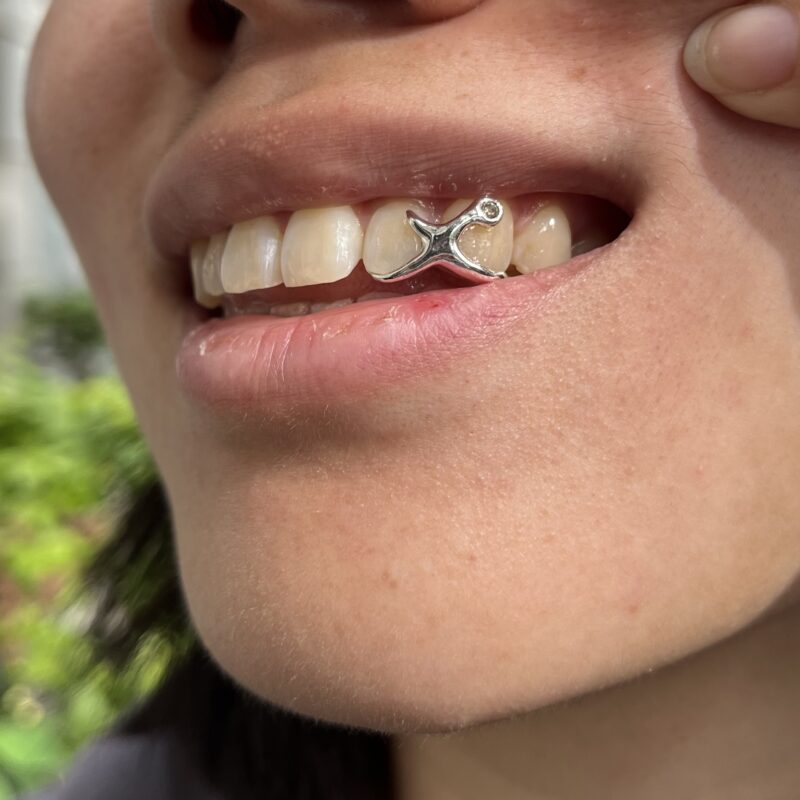 custom silver grillz with gemstones